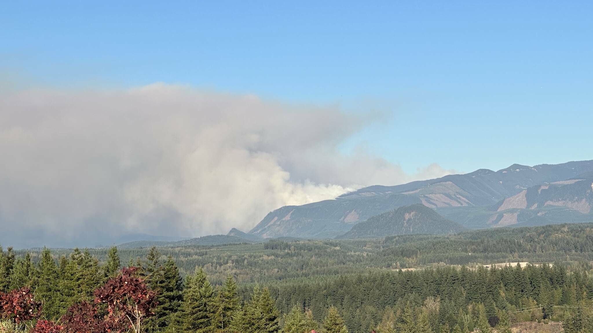 Smoke from the 2022 Loch Katrine Wildfire, burning 13 miles outside North Bend, WA. Photo courtesy of Calder Productions