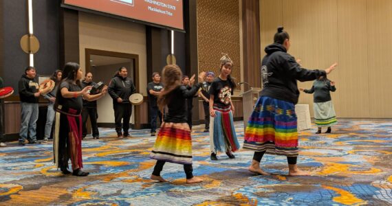 The Muckleshoot Canoe Family begin the coordinator gathering with a cultural opening ceremony. Photo by Bailey Jo Josie/Sound Publishing