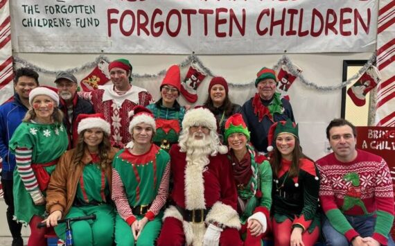 Santa and his elves will be delivering gifts to families who otherwise might not be able to afford Christmas throughout western Washington. Photo courtesy of Greg Bakke.