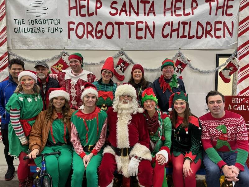 Santa and his elves will be delivering gifts to families who otherwise might not be able to afford Christmas throughout western Washington. Photo courtesy of Greg Bakke.