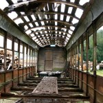 A late-morning gray light creeps through the arched and pockmarked roof of an old Turtleback streetcar that once operated in Tacoma. Today, it sits on a 40-acre field in Rockport, Wash., and is owned by Historic Railway Restoration. (PHOTO BY TODD MATTHEWS)