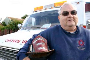 Tacoma resident Ralph Decker is one of several Fire Buffs who supports firefighters at emergency scenes. Decker and his wife, Michelle, serve food and water to firefighters and fire victims out of a mobile canteen unit. Decker has a long connection to the Tacoma Fire Department. He has served as the official photographer since 1971, and co-wrote a history of the department. (PHOTO BY TODD MATTHEWS)
