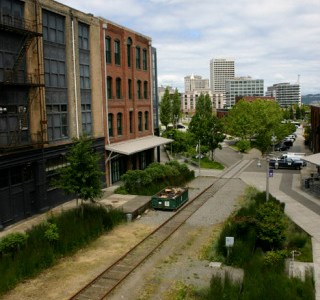 The former Prairie Line cuts through the University of Washington Tacoma campus toward downtown and the waterfront. It could be converted into a trail for bikes and pedestrians traveling between South Tacoma and the city's central business district, according to a development deal presently being considered by the City of Tacoma and Burlington Northern Santa Fe Railway. (PHOTO BY TODD MATTHEWS)