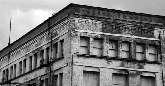 Abandoned for more than two decades, the six-story Luzon Building has seen better days. Downtown Tacoma-based Gintz Group hopes the building's natural light and large floor plans will appeal to tenants once a $7.5 million renovation is complete. (PHOTO BY TODD MATTHEWS)