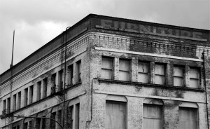 Abandoned for more than two decades, the six-story Luzon Building has seen better days. Downtown Tacoma-based Gintz Group hopes the building's natural light and large floor plans will appeal to tenants once a $7.5 million renovation is complete. (PHOTO BY TODD MATTHEWS)