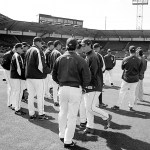 Players warm up last spring, days away from the beginning of the season. (PHOTO BY TODD MATTHEWS)