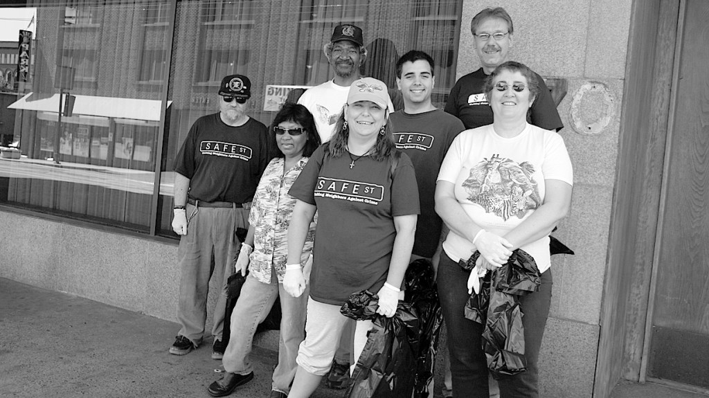 Safe Streets representative Anders Ibsen (center) joined Winthrop residents (from left to right) John 'Yo-Yo Man' Heffler, Dinah Young, Charles Jones, Lorna Fournier, Glenn Grigsby, and Autumn Wolfe in the neighborhood clean-up. (PHOTO BY TODD MATTHEWS)