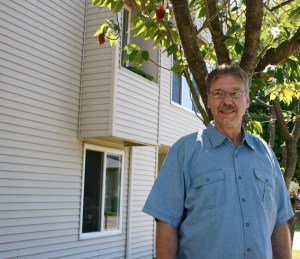 "That's a chapter in my life that I'm closing and I'm beginning a new one," says Glenn Grigsby, referring to the 15 years he spent living at the Winthrop Hotel in downtown Tacoma. He recently moved to HUD-subsidized housing in Tacoma's North End. "It's peaceful here. It's quiet. This is a new beginning for me." (PHOTO BY TODD MATTHEWS)