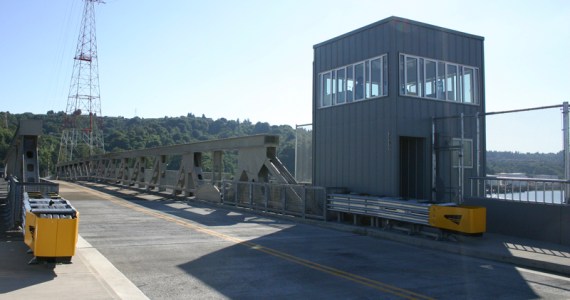 Representatives from the City of Tacoma and the Port of Tacoma celebrated the official re-opening of the Hylebos Bridge during a ribbon-cutting ceremony Wednesday. The bridge was out of commission for more than a decade before funding from the City of Tacoma, the Federal Highway Administration, and the Port of Tacoma paid for repairs. The Hylebos Bridge, which spans the Hylebos Waterway on East 11th Street, is an important transportation corridor for truck drivers hauling cargo throughout the tide flats and Northeast Tacoma residents headed toward State Route 509. (PHOTO BY TODD MATTHEWS)