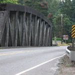 The concrete McMillin Bridge has a long history in Pierce County. Built in 1934, it is an important section of State Route 162 that connects Orting to Sumner. The bridge is listed on the National Register of Historic Places and was designed by Homer M. Hadley, whose work contributed to bridges spanning rivers, lakes and creeks throughout Washington State. (PHOTO BY TODD MATTHEWS)
