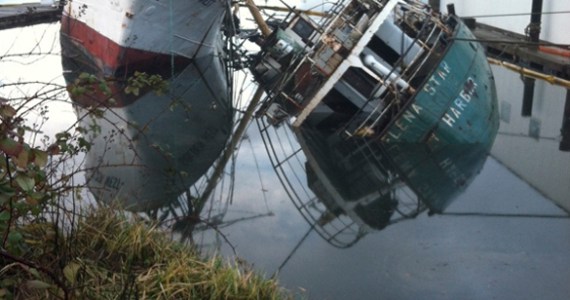 In January, the Helena Star sank in the Hylebos Waterway, dragging the 130-foot fishing vessel Golden West over to an extreme angle. (PHOTO COURTESY WASHINGTON STATE DEPARTMENT OF ECOLOGY)