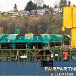 An up-close look at the ship carrying Bertha, the SR 99 tunneling machine, into Seattle's Elliott Bay on April 2, 2013. The five-story-tall machine arrived aboard the Jumbo Fairpartner in 41 pieces that will be reassembled in a pit near Seattle's stadiums before tunneling begins in summer 2013. (PHOTO COURTESY WASHINGTON STATE DEPARTMENT OF TRANSPORTATION)