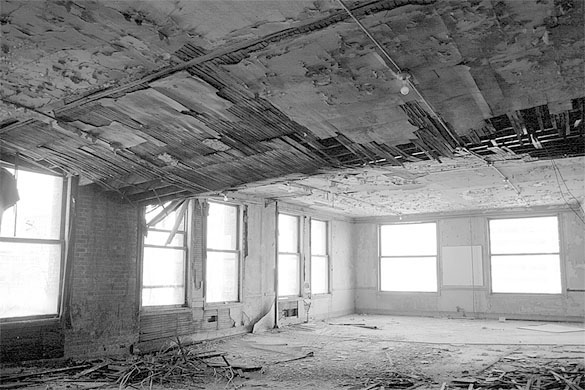 The former Luzon Building in downtown Tacoma, which was designed by two famous Chicago architects, constructed in the 1890s, and demolished in 2009 after the City of Tacoma deemed the historically significant building a safety hazard for fear it would collapse after decades of neglect. A glimpse inside the building prior to its demolition. (FILE PHOTO / TACOMA DAILY INDEX)