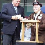 AUGUST 23, 2003 | U.S. Rep. Norm Dicks (D-Wash) joins Cliff Fournier, 86, of Tenino, Wash., the last living trolley operator from the Tacoma Railway and Power Co., as he rings the bell that officially launches Tacoma Link light rail. (TACOMA DAILY INDEX FILE PHOTO)