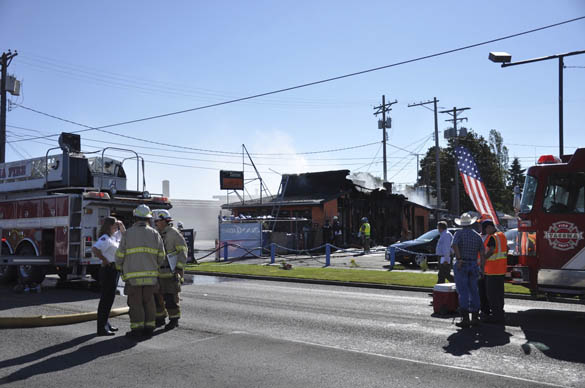 Tacoma fire fighters battle a blaze at a tavern on South Tacoma Way on Aug. 20. (PHOTO COURTESY TACOMA FIRE DEPARTMENT)