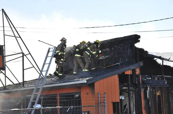 Tacoma fire fighters battle a blaze at a tavern on South Tacoma Way on Aug. 20. (PHOTO COURTESY TACOMA FIRE DEPARTMENT)