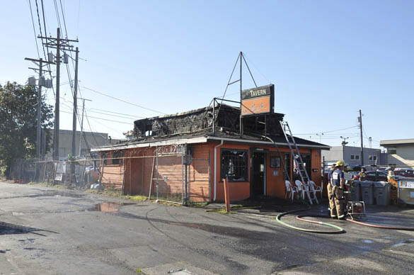 Tacoma fire fighters battle a blaze at a tavern on South Tacoma Way on Aug. 20. (PHOTO COURTESY TACOMA FIRE DEPARTMENT)