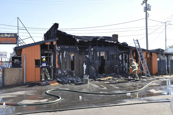 Tacoma fire fighters battle a blaze at a tavern on South Tacoma Way on Aug. 20. (PHOTO COURTESY TACOMA FIRE DEPARTMENT)