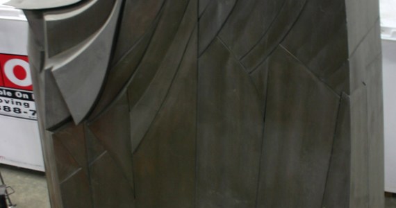 Tacoma's 'Sun King,' a three-ton, 15-foot-tall, 22-foot-wide steel frame sculpture by Corvallis, Ore., artist Tom Morandi is being stored at the City of Tacoma's Fleet Operations Headquarters. It sat near the corner of Broadway and South 13th Street for three decades before it was placed in storage seven years ago to make way for a new piece of public art. (PHOTO BY TODD MATTHEWS)