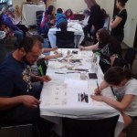 Metro Parks Tacoma hosted a centennial celebration this weekend for the Pagoda in Point Defiance Park. The event included free cultural history and natural history tours aboard two Pierce Transit trolleys reminiscent of the early 1900s streetcars that historically served the park. Visitors were also invited to explore the building, enjoy live music and refreshments, create handmade event souvenirs, and learn about the history of the Pagoda and future plans for the Japanese Gardens which surround it. (PHOTOS / IMAGES COURTESY METRO PARKS TACOMA)