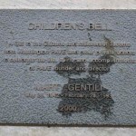 The City of Tacoma recently completed a project to restore the Children's Bell sculpture located along Ruston Way near the shores of Commencement Bay. The four-foot-tall bronze artwork was created in 2000 by artist Larry Anderson in order to celebrate the life, spirit, and accomplishments of Washington PAVE Founder and Director Marty Gentili, who passed away in 1993. The bell is decorated with images of children around the border and is meant to be rung by visitors. In April, area visitors noticed safety barricades were in place around the sculpture while the contractor spent several weeks completing restoration work on the Children's Bell sculpture. (PHOTO BY TODD MATTHEWS)