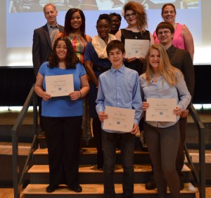 A group of Pierce County high school students were named 2014 Young Entrepreneurs Academy Chief Executive Officers during a commencement ceremony Wednesday at the STAR Center in Tacoma. Pictured are (back row) Tacoma-Pierce County Chamber Board Chair Jeff Brown; Young Entrepreneurs Academy Assistant Program Director Natasha Johnson; Young Entrepreneurs Academy Program Director Lynnette Buffington; (middle row) Mount Tahoma High School senior Lyric Swanson; Stadium High School junior LaMondtra Atkins; Tacoma School of the Arts junior Madison Chavez; Lincoln High School senior Arthur Hagen; (bottom row) Mount Tahoma High School senior Jessica Bokoskie; Stadium High School freshman Sam Wheelock; and Bellarmine Prep freshman Gracie Weiss. (PHOTO COURTESY TACOMA-PIERCE COUNTY CHAMBER)