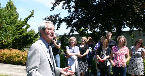 Artist Tom Morandi discussed the history of Sun King during a celebration Wednesday to mark the installation of his sculpture in a public park near Thea Foss Waterway. (PHOTO BY TODD MATTHEWS)