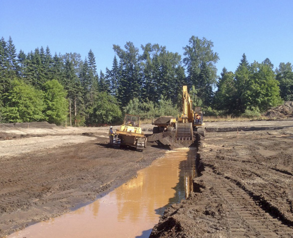 Crews excavated a side channel last summer as part of a project that will reconnect the Puyallup River to its historic floodplain near Orting. (PHOTO COURTESY PIERCE COUNTY)