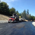 A stretch of 9th Street East, between 190th Avenue East and 198th Avenue East, was reconstructed to enhance safety by re-aligning and regrading the roadway to increase sight distances. The road was closed in June to allow a Pierce County contractor to excavate the site and lay asphalt. The road was re-opened last week, nearly two weeks ahead of schedule. Crews will continue to work along the roadway through September in order to allow crews to complete planting preparation aspects of the project. Periodic lane restrictions are expected during that time. (IMAGE COURTESY PIERCE COUNTY)