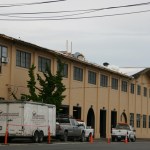 Work is under way to replace the roof on the 104-year-old former Tacoma Municipal Barn in downtown Tacoma. The building was recently added to Tacoma's Register of Historic Places. (PHOTO BY TODD MATTHEWS)