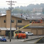 Work is under way to replace the roof on the 104-year-old former Tacoma Municipal Barn in downtown Tacoma. The building was recently added to Tacoma's Register of Historic Places. (PHOTO BY TODD MATTHEWS)