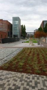 Contractors on Tuesday were putting the finishing touches on a segment of the Prairie Line Trail that runs through the University of Washington Tacoma (UWT) campus. City of Tacoma and UWT officials will celebrate the grand opening of the first phase of the new urban trail during a public ceremony on Thurs., Sept. 25, at 5 p.m. (PHOTO BY TODD MATTHEWS)