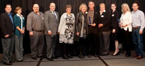 FROM LEFT TO RIGHT: Representatives of AlphaGraphics Tacoma, Stewart & Son Computer Services, Pacific Continental Bank, Power Crews, Kel-Tech Plastics, FISH Food Banks of Pierce County, and Rally Point/6 received 2014 Spotlight! On Business Awards during a luncheon ceremony Wednesday at Hotel Murano in downtown Tacoma. (PHOTO COURTESY TACOMA-PIERCE COUNTY CHAMBER)
