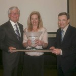 Tom Taylor (LEFT) and Steve Thomason (RIGHT) of Taylor-Thomason Insurance Brokers presented the Tacoma-Pierce County Chamber's 10th Annual Tahoma Environmental Business Award to Elaine Ott of Richlite Company in 2012. (PHOTO COURTESY TACOMA-PIERCE COUNTY CHAMBER)