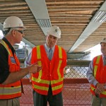 Washington State Governor Jay Inslee (center) toured the construction site for the new State Route 167 Puyallup River Bridge on May 27. Atkinson Construction Senior Vice President Bob Adams (left) and Washington State Department of Transportation (WSDOT) Region Administrator Kevin Dayton (right) explained some of the challenges of constructing the new $31.2 million bridge. (PHOTO COURTESY WSDOT)