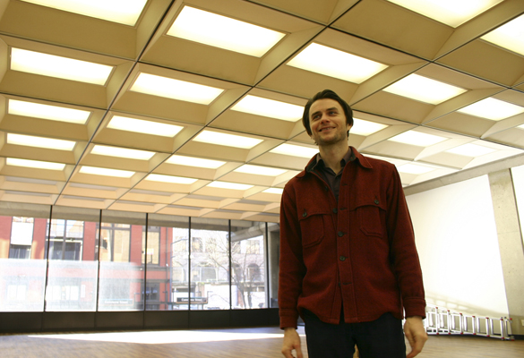 Spaceworks Tacoma Marketing and Artscapes Coordinator Gabriel Brown inside 1120 Creative House. (FILE PHOTO BY TODD MATTHEWS)