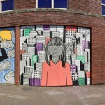 Spaceworks Tacoma's Artscapes program turns downtown storefront windows and outdoor wall spaces into canvases for local artists, including a building facade near Market Street and South 11th Street. (PHOTO COURTESY ANGELA LARSEN / SPACEWORKS TACOMA)