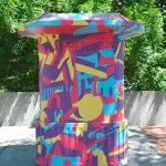 Spaceworks Tacoma's Artscapes program turns downtown storefront windows and outdoor wall spaces into canvases for local artists, including a concrete kiosk near Market Street and South 13th Street. (PHOTO COURTESY SPACEWORKS TACOMA)