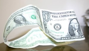 A Möbius strip is a surface with only one side and only one boundary. An example of a Möbius strip can be created by taking a paper strip (or dollar bills!) and giving it a half-twist, and then joining the ends of the strip to form a loop.Photo by Danielle Nease