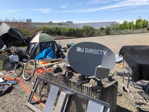 The emergence of homeless camps, like this one near the Port of Tacoma, parallels the rise of McMansions and inflated real estate prices. Photo: Morf Morford