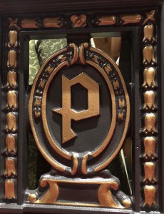 This detail from the end cap of each row of seats shows the craft and care taken in the restoration of this capstone of Tacoma's art scene. Photo by Morf Morford