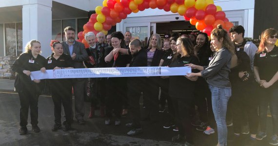 A variety of community representatives were on hand to welcome a new store - and employer to East Tacoma. Photo: Morf Morford