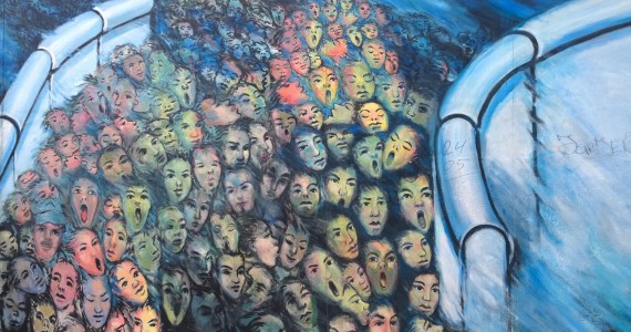 This detail from the remnant of the Berlin Wall tells it all. What more could be said about the inherent human aspiration for freedom and opportunity against any obstacle? Photo: Morf Morford