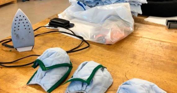 Completed surgical masks are displayed at the aviation survival technician&rsquo;s shop at Coast Guard Sector North Bend, Oregon, April 10, 2020. Manufacturing the masks is meant to bolster supplies for the community first responders in preparation of the fight against COVID-19. (Photo by Petty Officer 3rd Class Trevor Lilburn, Photo courtesy of U.S. Coast Guard Sector North Bend)