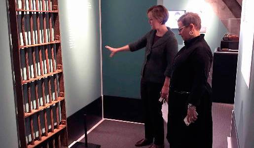 Washington State Historical Society Director Jennifer Kilmer and Director of Audience Engagement Mary Mikel Stump stand in a space representing the size of a prison cell from McNeil&rsquo;s Territorial prison days. Image courtesy Washington State Historical Society