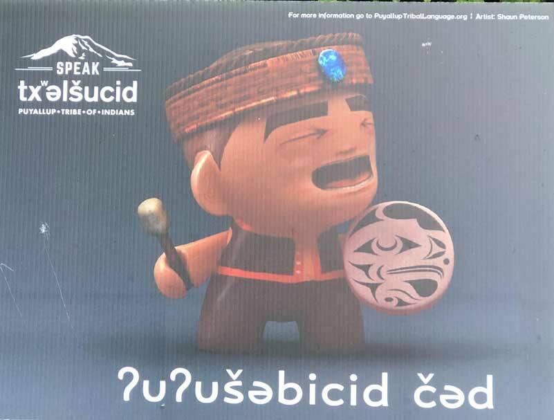 You may have seen these posters around the area. For more information look here: https://www.puyalluptriballanguage.org/. (Photo by Morf Morford)