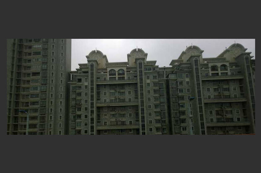 These look-alike buildings on the outskirts of Shanghai solve many problems - but they might create just as many. (Photo by Morf Morford)