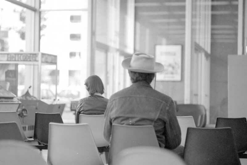 Travelers patiently wait in the lobby of the Greyhound Bus Terminal in 1979. The bus station was built in 1959 from an ultra modern design by Decker, Christenson & Kitchin of Seattle. By 2000, the ultra modern building was considered an eyesore and it was demolished. Image and text courtesy of Tacoma Public Library. Cysewski Collection CYS-T270