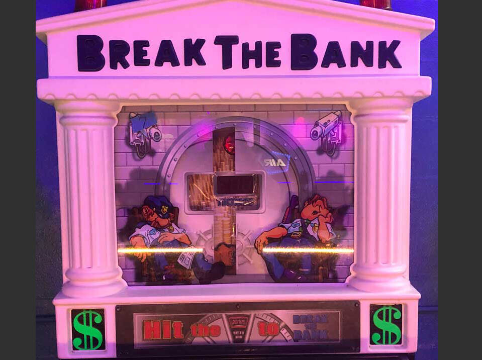 This scene from a video game captures much of our ambiguity about banks. From the sleeping guards to the invitation to break the bank, the implication is that any given bank is not as careful with our assets as we might be. (Photo by Morf Morford)