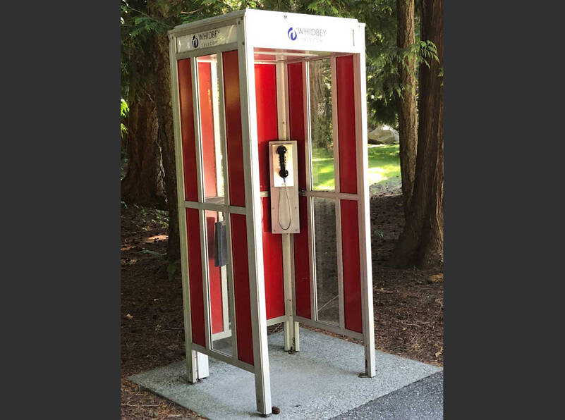 For decades, superheroes and stranded travellers sought refuge here. Standing vigil over the entrance to another era, this phone booth, like other secret passages, leads to distant places, mysteries and long lost secrets. It never pretended to be smart. (Photo by Morf Morford)